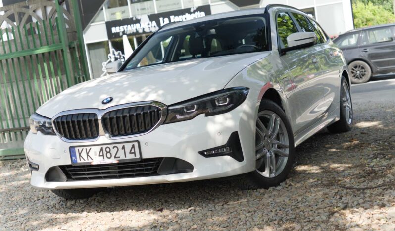 
								BMW 330e full									
